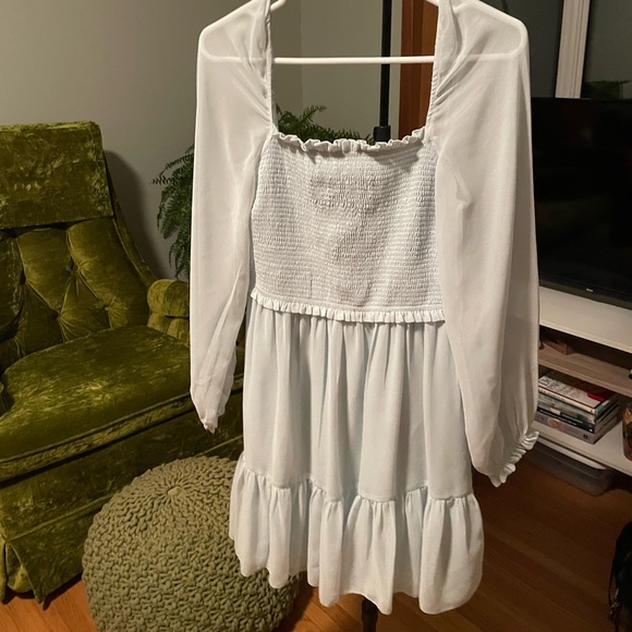 Bohen Smocked Mini Dress in Baby Blue. - Picture 2 of 3